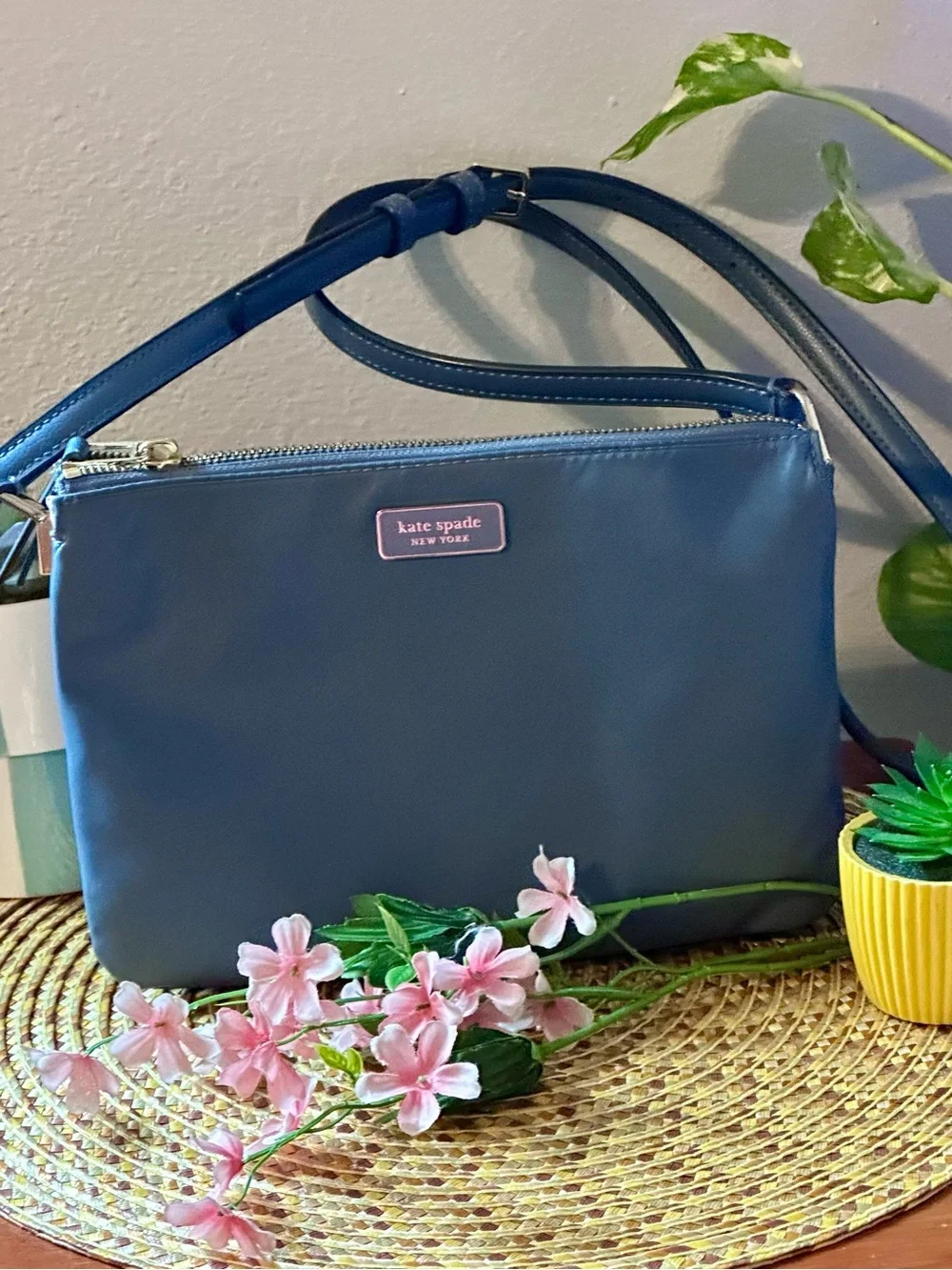 Kate Spade navy blue leather crossbody bag with adjustable strap